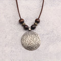 Brown beads with shallow kelat stripes