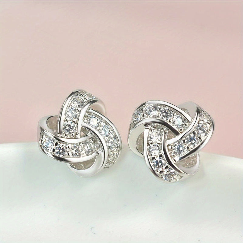 Stud Earrings In A Love Knot Cross Design Anniversary Celebrations And Daily Wear