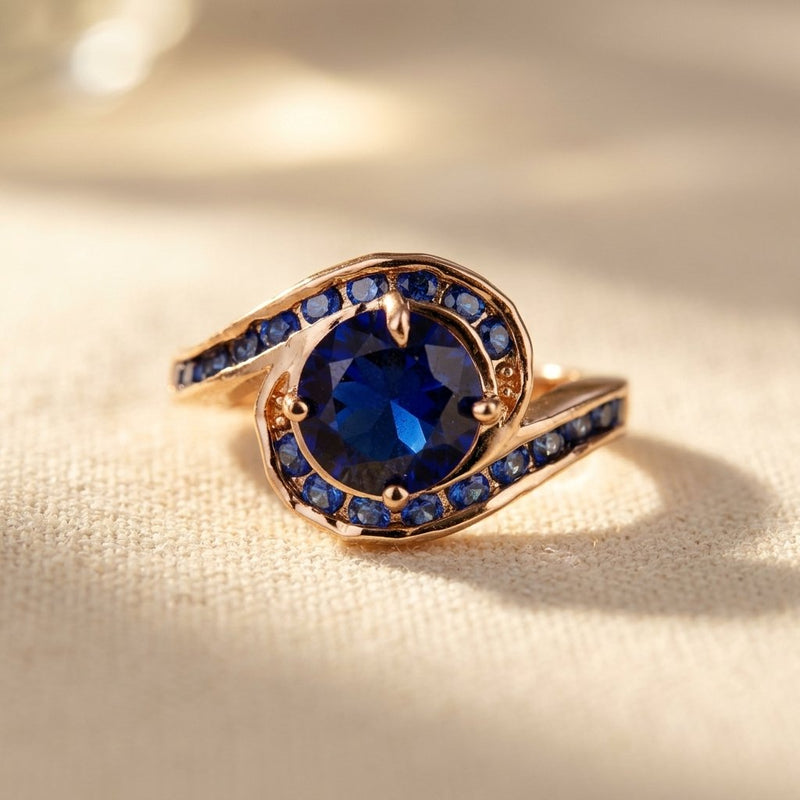 Gold Sapphire Blue Round Halo Ring