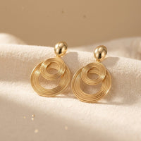 Golden Spring Coiled Double Layered Drop Earrings