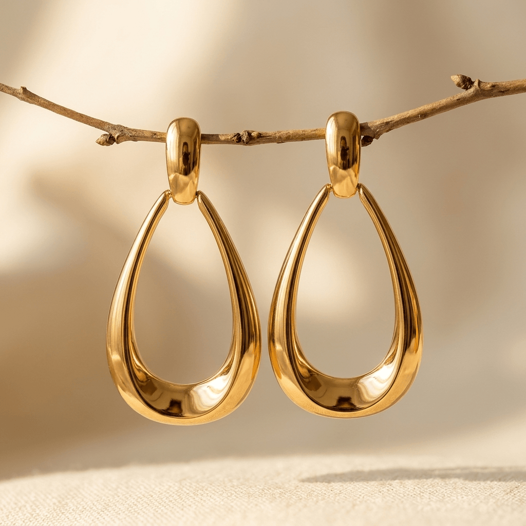 Gold Polished Teardrop Dangle Earrings