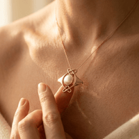 Gold Pearl Infinity Knot Pendant Necklace
