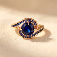 Gold Sapphire Blue Round Halo Ring