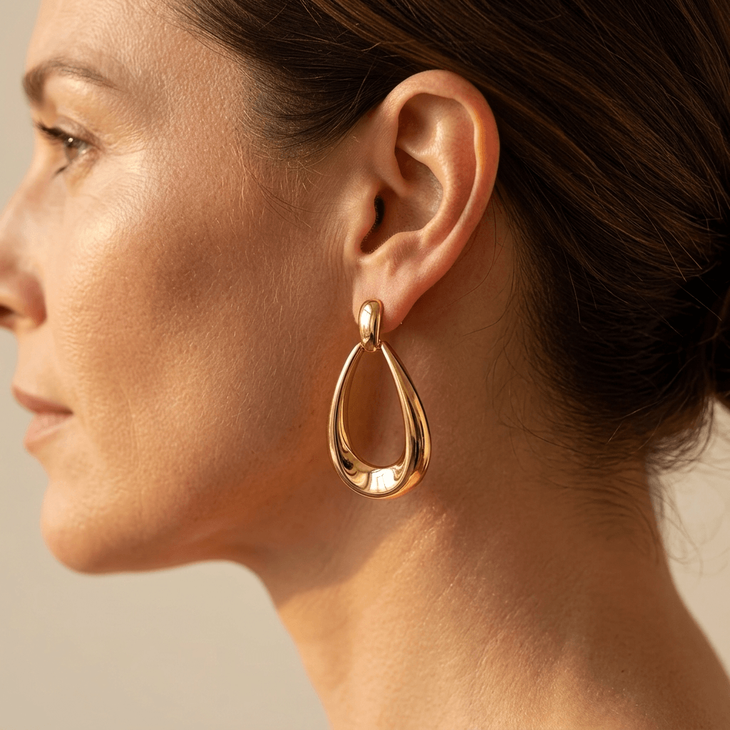 Gold Polished Teardrop Dangle Earrings