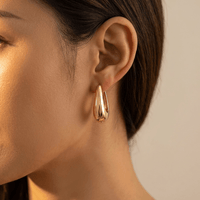 Elegant Gold Polished Teardrop Hoop Earrings