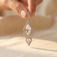 Sparkling Drop Earrings With Inlaid Stones